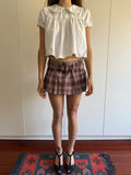 00s MINI SKIRT WITH BELT AND SHORTS