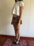 00s MINI SKIRT WITH BELT AND SHORTS