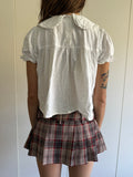 00s MINI SKIRT WITH BELT AND SHORTS